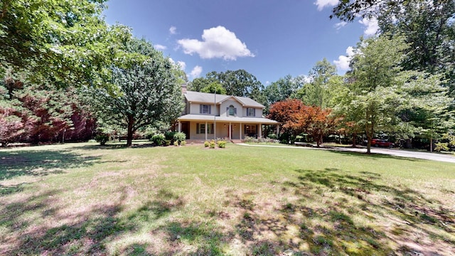 830 Motlow College Rd, Normandy, TN 37360 - view of front facade featuring a front yard, a chimney, and covered porch