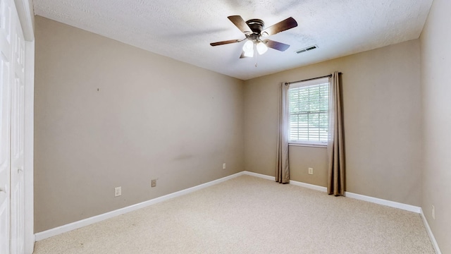 830 Motlow College Rd, Normandy, TN 37360 - empty room with carpet, ceiling fan, and a textured ceiling