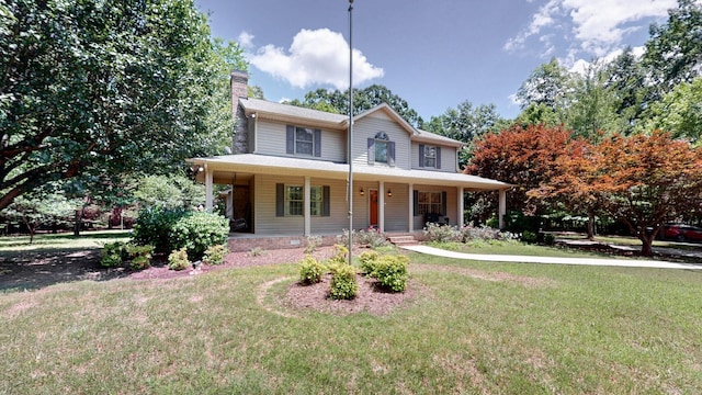 830 Motlow College Rd, Normandy, TN 37360 - view of front of house featuring a chimney, a front lawn, and covered porch