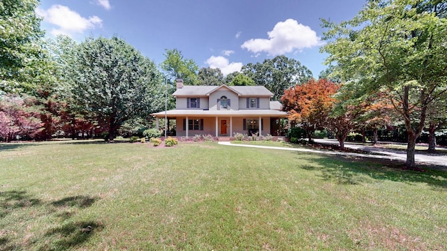 830 Motlow College Rd, Normandy, TN 37360 - country-style home featuring covered porch, a chimney, and a front yard