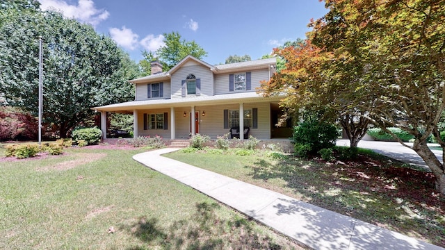 830 Motlow College Rd, Normandy, TN 37360 - farmhouse inspired home featuring a chimney, a front yard, and covered porch
