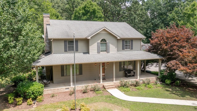 830 Motlow College Rd, Normandy, TN 37360 - farmhouse-style home featuring a chimney, a porch, a front yard, and roof with shingles