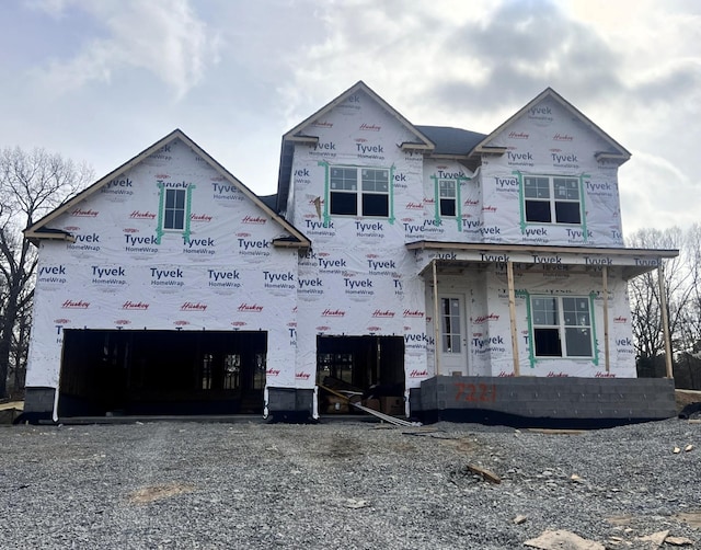 property under construction with a garage and driveway