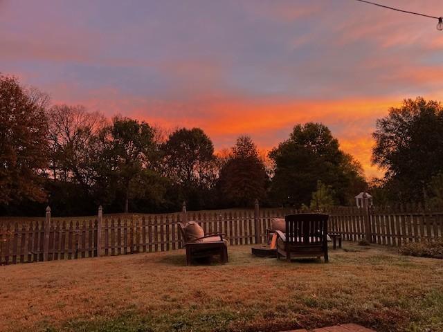 yard at dusk with fence