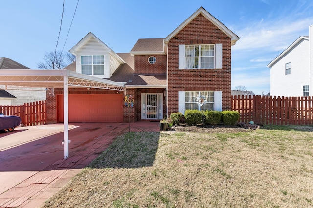 view of front of house with a garage, brick siding, a front yard, and fence