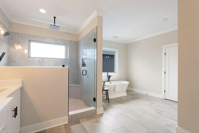 bathroom featuring a soaking tub, visible vents, ornamental molding, a shower stall, and vanity