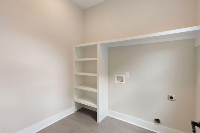 laundry room with washer hookup, electric dryer hookup, wood finished floors, laundry area, and baseboards