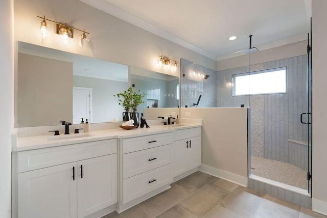 full bath with a stall shower, tile patterned floors, a sink, and double vanity