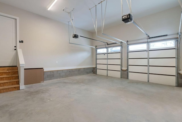 garage featuring a garage door opener