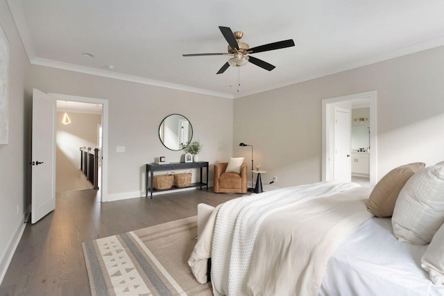 bedroom featuring baseboards, wood finished floors, a ceiling fan, and crown molding