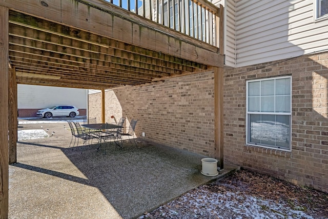 view of patio featuring outdoor dining space