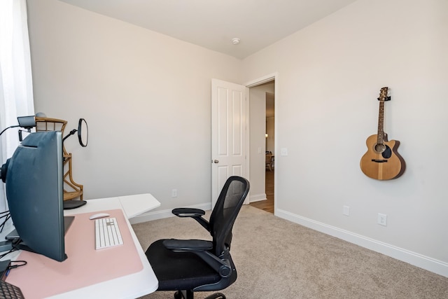 carpeted office with baseboards