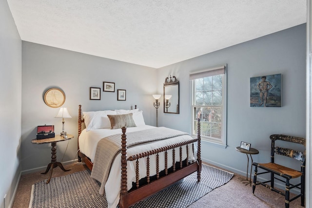 bedroom featuring carpet flooring, a textured ceiling, and baseboards