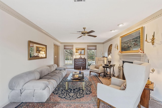 living room with carpet, a fireplace, visible vents, and crown molding