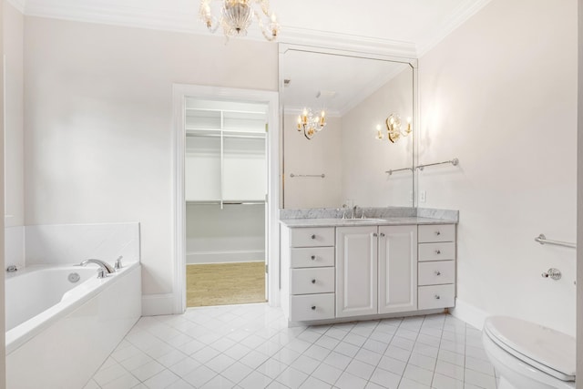 bathroom featuring a garden tub, a notable chandelier, ornamental molding, vanity, and tile patterned flooring