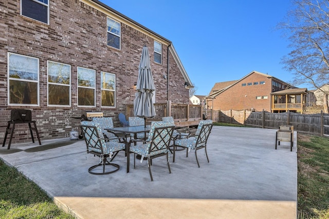 view of patio / terrace with outdoor dining area and a fenced backyard