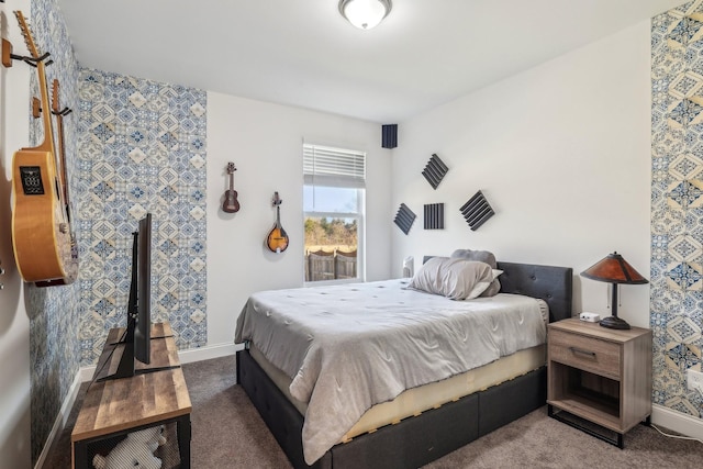 bedroom with carpet flooring and baseboards