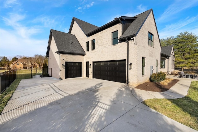 105 Stillwind Ct, Nolensville, TN 37135 - view of home's exterior with roof with shingles, fence, a garage, and concrete driveway