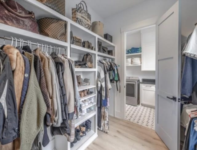 105 Stillwind Ct, Nolensville, TN 37135 - walk in closet featuring light wood-style flooring and washer / dryer