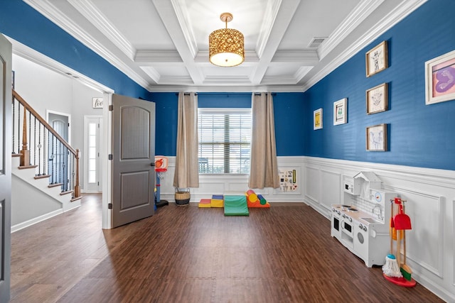 rec room with beam ceiling, visible vents, wainscoting, wood finished floors, and coffered ceiling