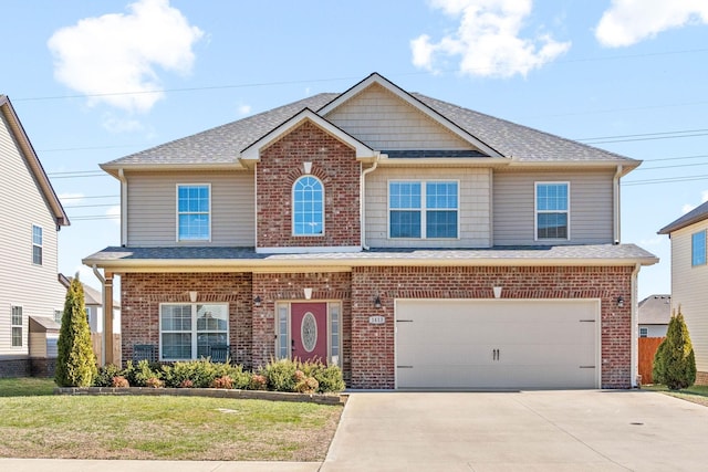 view of front of property with a front yard, brick siding, driveway, and an attached garage