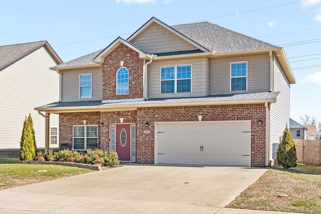 view of front of property with driveway, brick siding, and fence