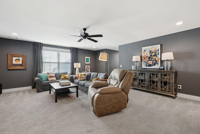 carpeted living area with recessed lighting, a ceiling fan, and baseboards