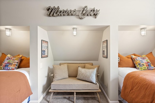 bedroom featuring carpet floors and baseboards