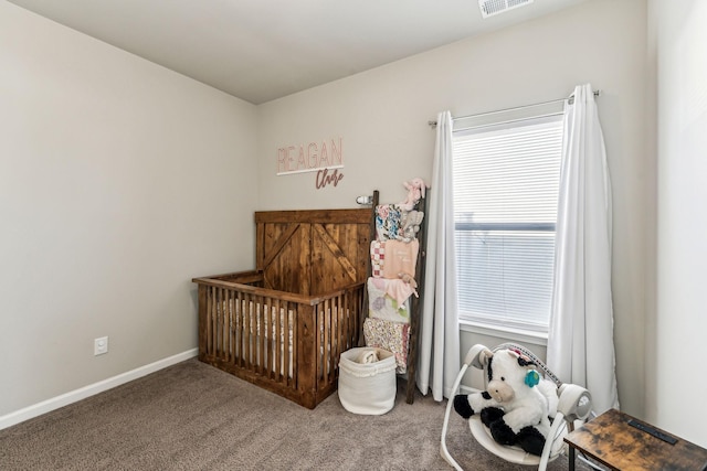 bedroom with carpet flooring, visible vents, and baseboards