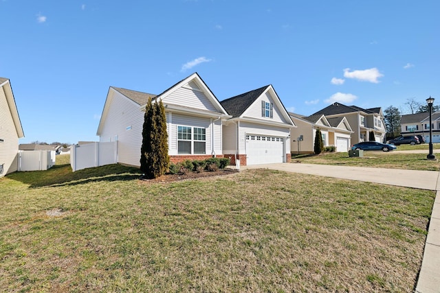 view of front of house featuring brick siding, concrete driveway, fence, a residential view, and a front lawn