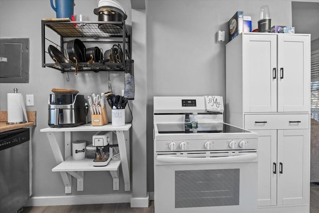 kitchen featuring electric range, white cabinetry, baseboards, stainless steel dishwasher, and electric panel