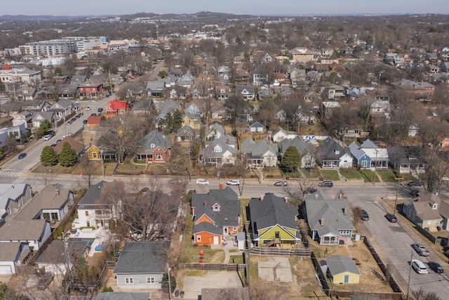 birds eye view of property with a residential view