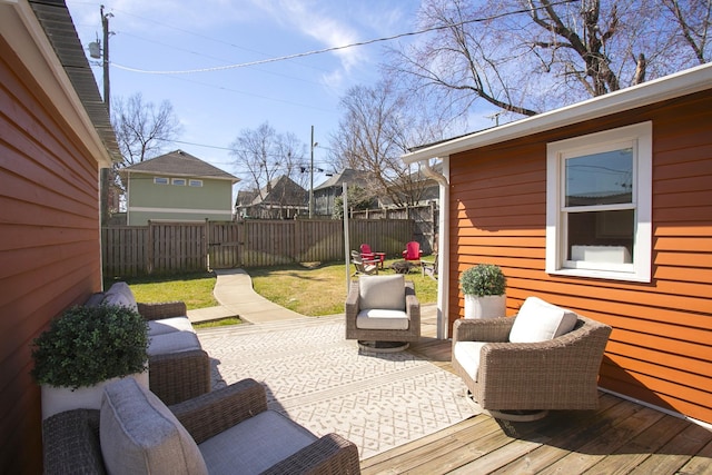 deck featuring a fenced backyard