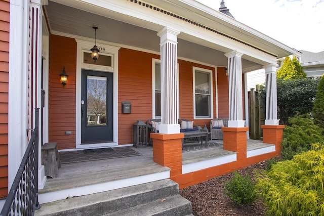 entrance to property featuring covered porch