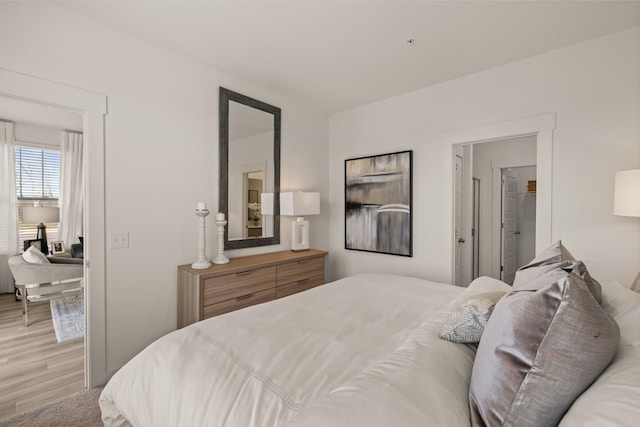 bedroom featuring wood finished floors