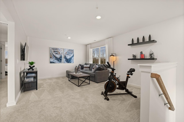 workout area featuring recessed lighting, carpet, and baseboards