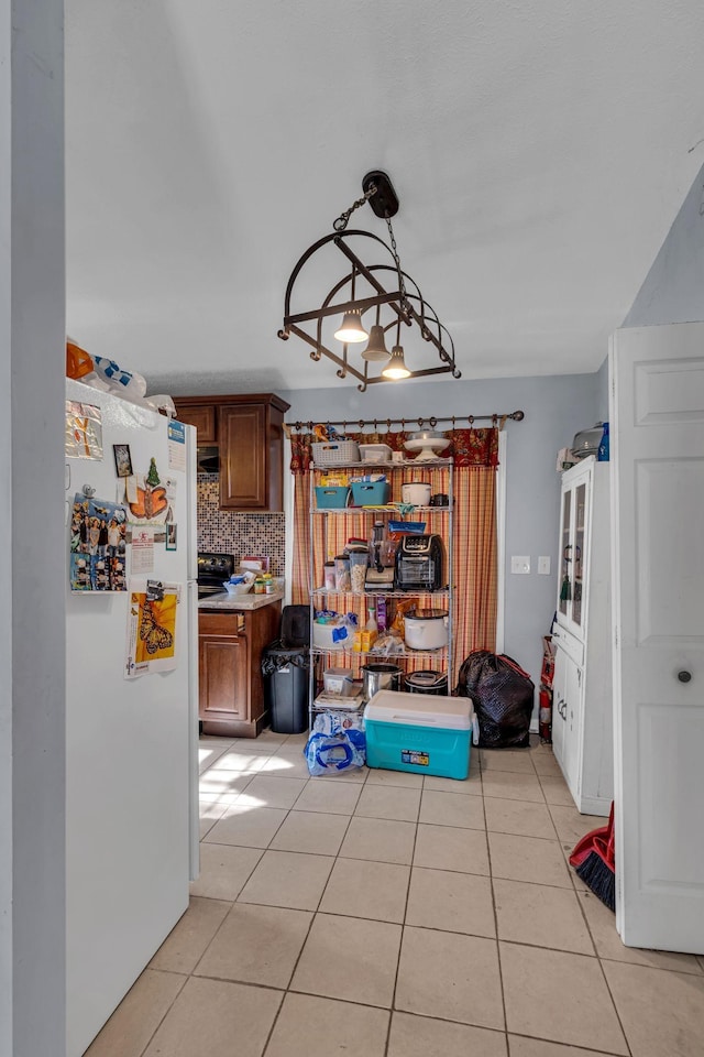 dining space with light tile patterned floors