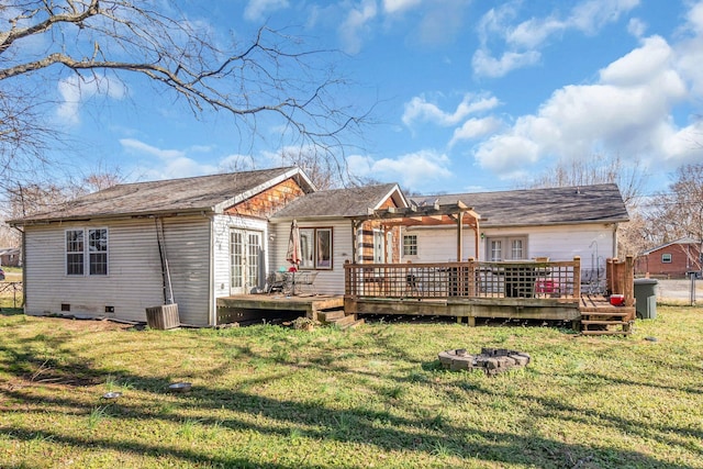 back of house with a yard, french doors, crawl space, a wooden deck, and a pergola