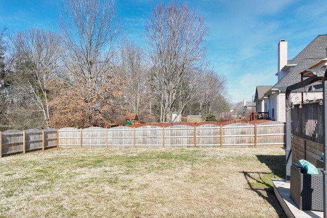 view of yard featuring a fenced backyard