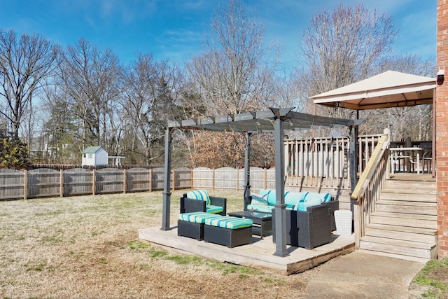 view of yard featuring a fenced backyard, an outdoor hangout area, a pergola, and a wooden deck