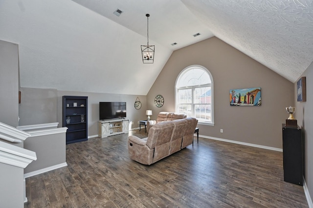 living room featuring lofted ceiling, visible vents, dark wood-type flooring, a textured ceiling, and baseboards