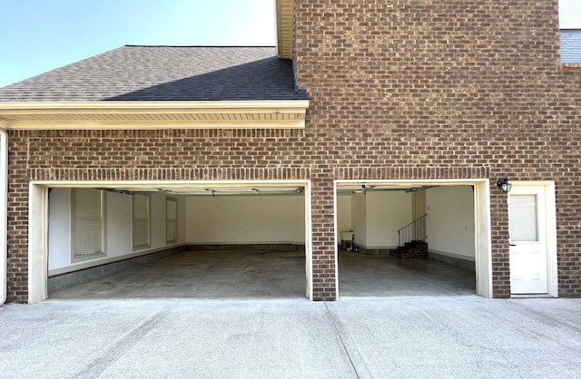 garage featuring driveway