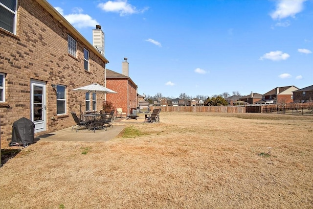 view of yard with a patio area and fence