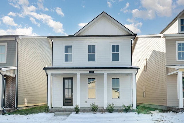 view of front of house with board and batten siding and covered porch