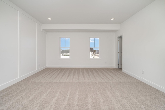 unfurnished room with baseboards, carpet flooring, and recessed lighting