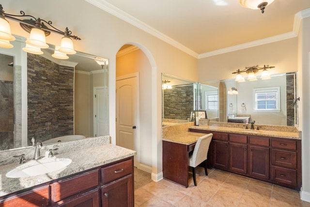 bathroom featuring crown molding and a sink