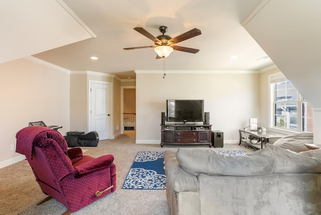 living area with a ceiling fan, light carpet, crown molding, and baseboards