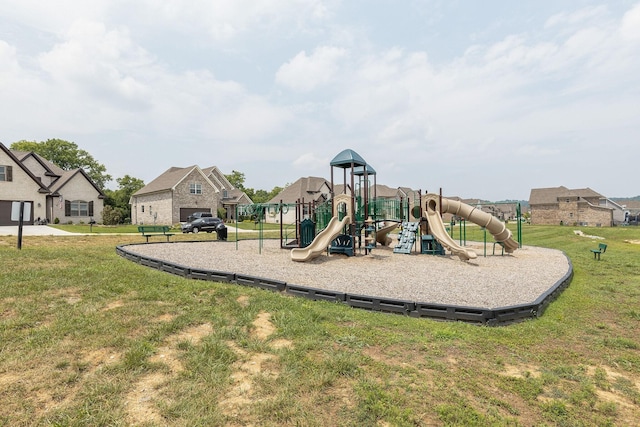 community play area featuring a residential view and a lawn