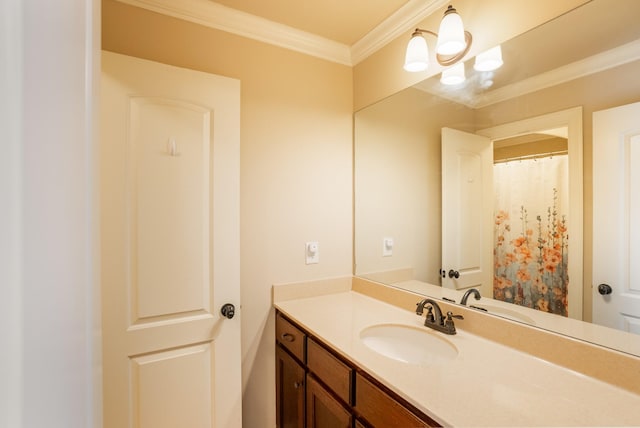 bathroom with a chandelier, crown molding, and vanity