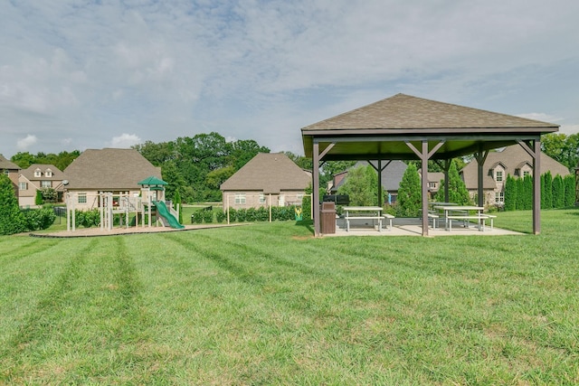 view of yard with a patio, playground community, and a gazebo